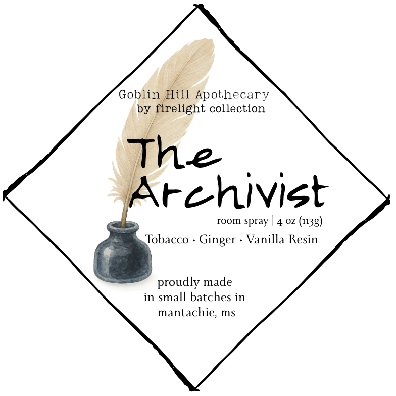Label for 'The Archivist' room spray from Goblin Hill Apothecary with a feather and small vase design.