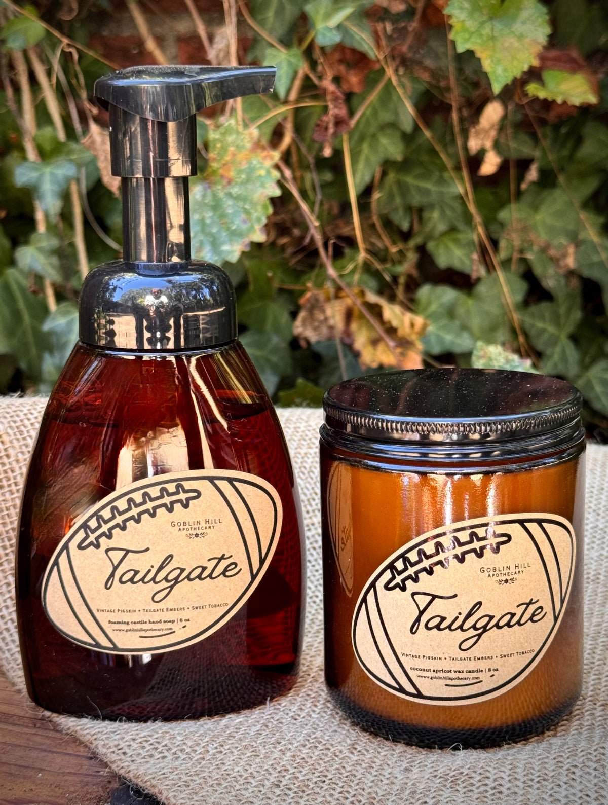 an amber pump bottle and amber jar on a burlap background