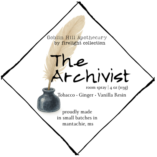 Label for 'The Archivist' room spray from Goblin Hill Apothecary with a feather and small vase design.