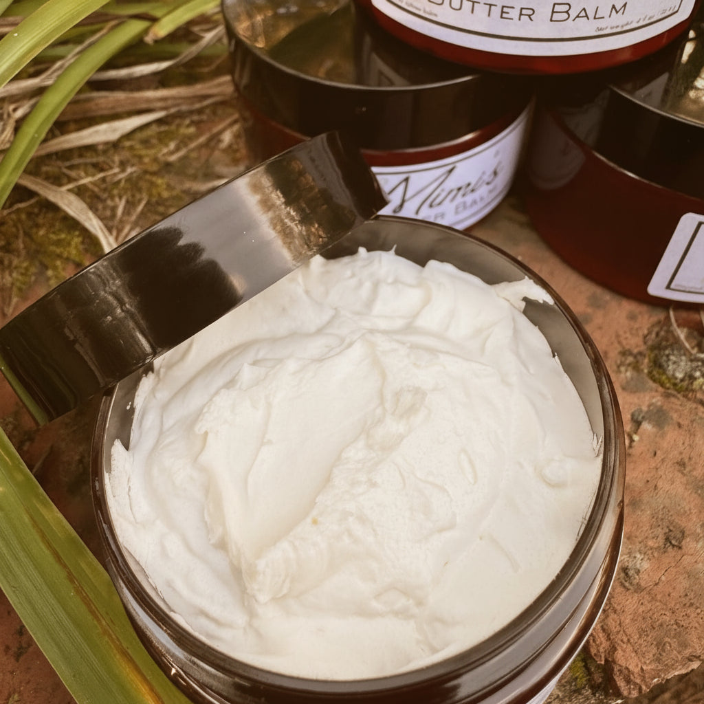 Balm with a black lid on a natural background