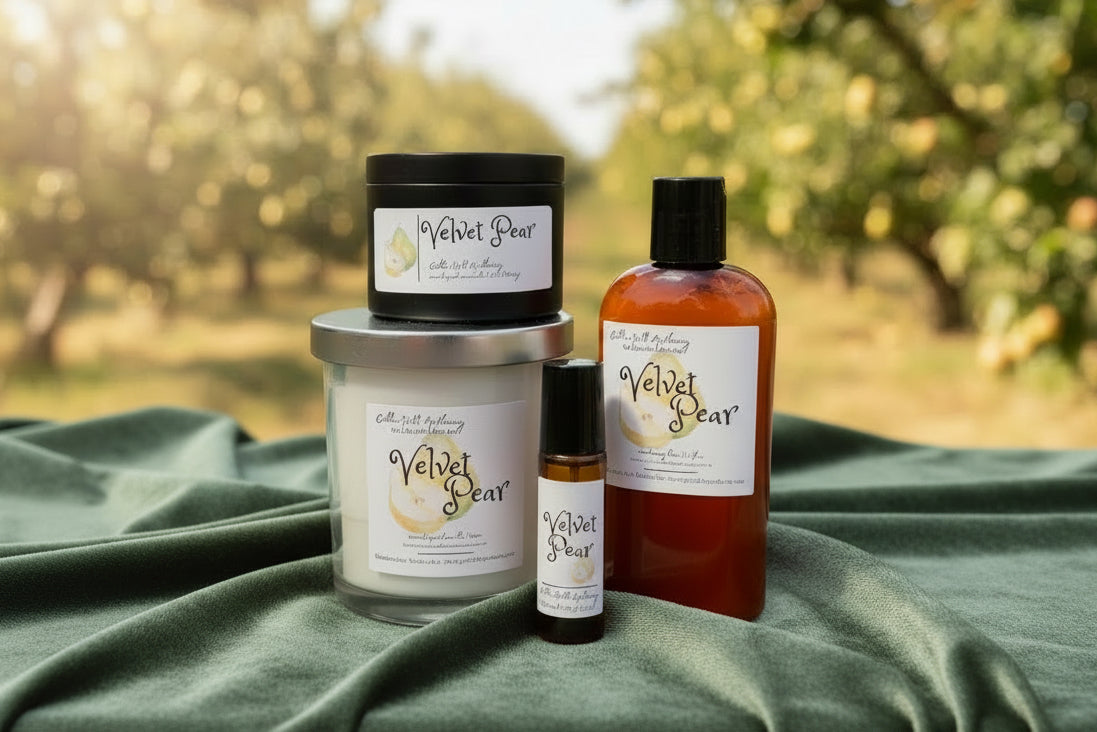 Picture of candles and lotion on a table in a pear orchard