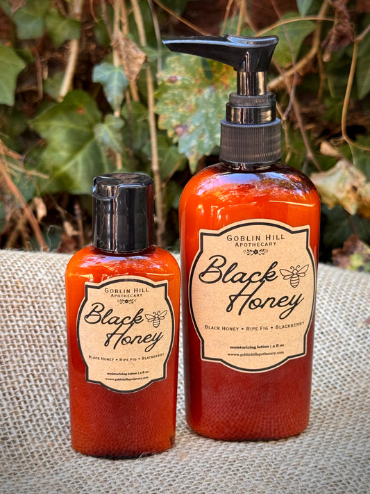 two amber lotion pump bottles