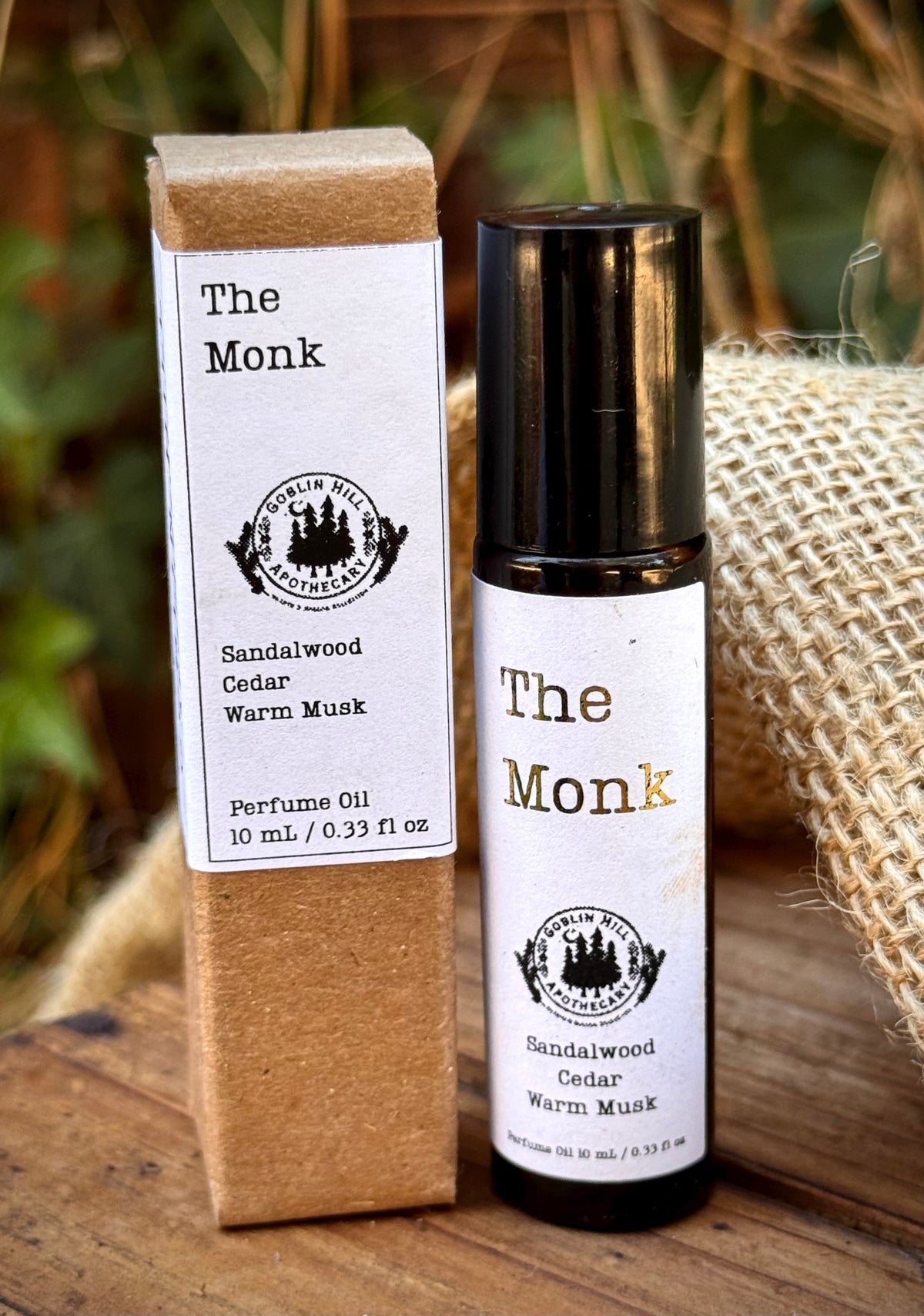 A bottle of perfume oil labeled "the monk"