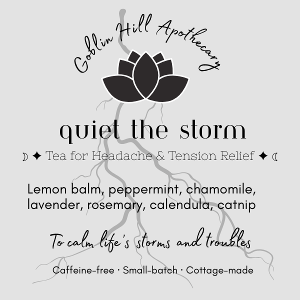 Tea packaging for 'Quiet the Storm' from Goblin Hill Apothecary with a black lotus flower design on a light gray background.