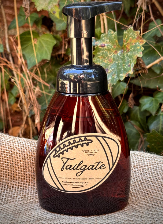 amber foaming pump bottle on a burlap background